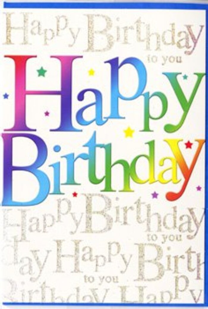 This photograph captures a stylish birthday card whose front design feels like a party in paper form, the sort of piece you might choose alongside a colourful bouquet for delivery in Mill Hill. Dominating the centre are the words Happy Birthday, written in broad, confident letters, each one filled with a different shade of the rainbow. The colours flow from deep reds and berry pinks through warm apricots and golden yellows into vibrant greens, serene blues, and velvety purples, creating a gradient that mirrors the variety of blooms you might see arranged by a local florist off The Broadway. The edges of the colours gently blur into one another, lending the lettering a soft, almost airbrushed texture that invites the eye to linger on every curve and corner. Behind this headline message, the card's background is covered with a repeating script of Happy Birthday to you, written in fine, swirling gold letters that glimmer like sunlight slanting through the trees over Mill Hill Park in the late afternoon. This golden script is delicate yet insistent, layering the sentiment over and over so that it feels like a crowd of friends quietly singing in the background. Subtle starbursts and tiny confetti dots, in coordinating pastel and metallic tones, are scattered across the design, adding a playful sparkle while keeping everything balanced and refined. The card's surface appears smooth with a gentle gloss, suggesting a pleasant, tactile feel when held. Overall, the design combines vivid colour, shimmering detail, and a sense of heartfelt celebration-perfect for honouring a special birthday in Mill Hill, whether placed beside a cake at home or paired with flowers arriving at a local restaurant.